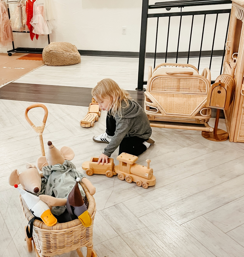 Young child playing in an indoor kids play space at The Trendy Bunny Studio
